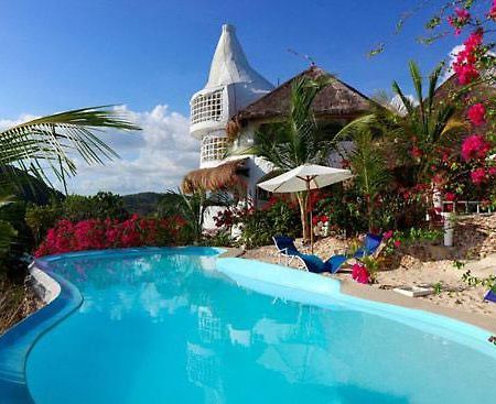 อัล ฟาโร กอสเมียว โฮเต็ล Hotel บูซวงกา ภายนอก รูปภาพ