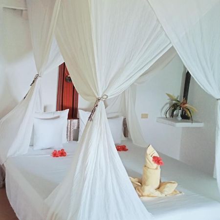 อัล ฟาโร กอสเมียว โฮเต็ล Hotel บูซวงกา ภายนอก รูปภาพ