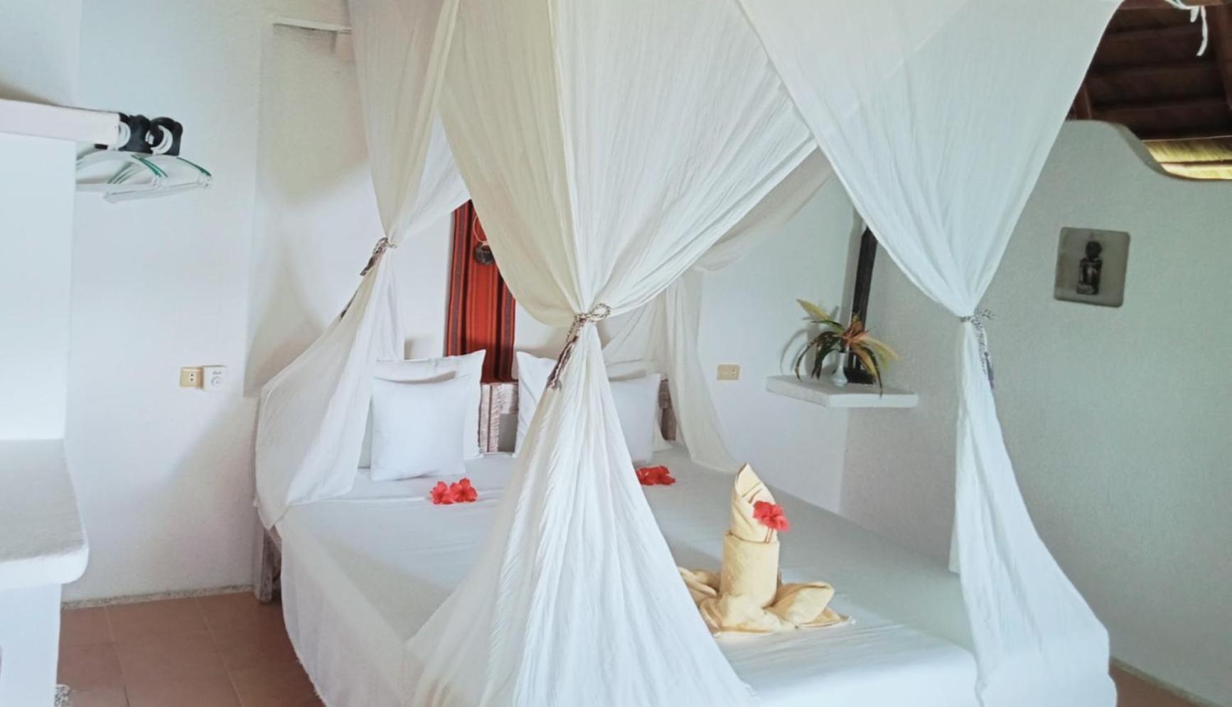 อัล ฟาโร กอสเมียว โฮเต็ล Hotel บูซวงกา ภายนอก รูปภาพ